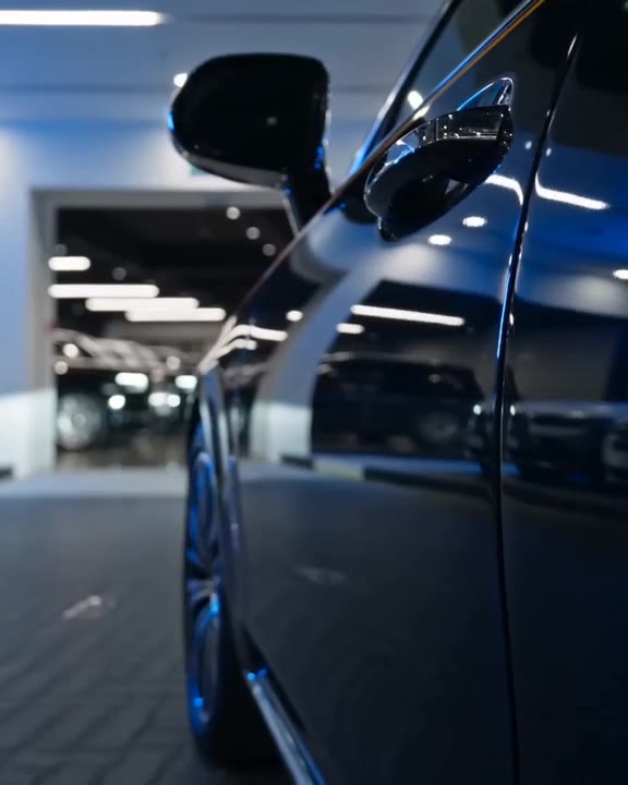 Close-up of a luxury vehicle in a fleet yard